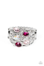 Load image into Gallery viewer, Infused with clusters of dainty white rhinestones, a glitzy collection of Pale Rosette, Fuchsia Fedora, and iridescent rhinestones are sprinkled across layers of silver bands, creating an ethereal sparkle across the finger. Features a dainty stretchy band for a flexible fit.
