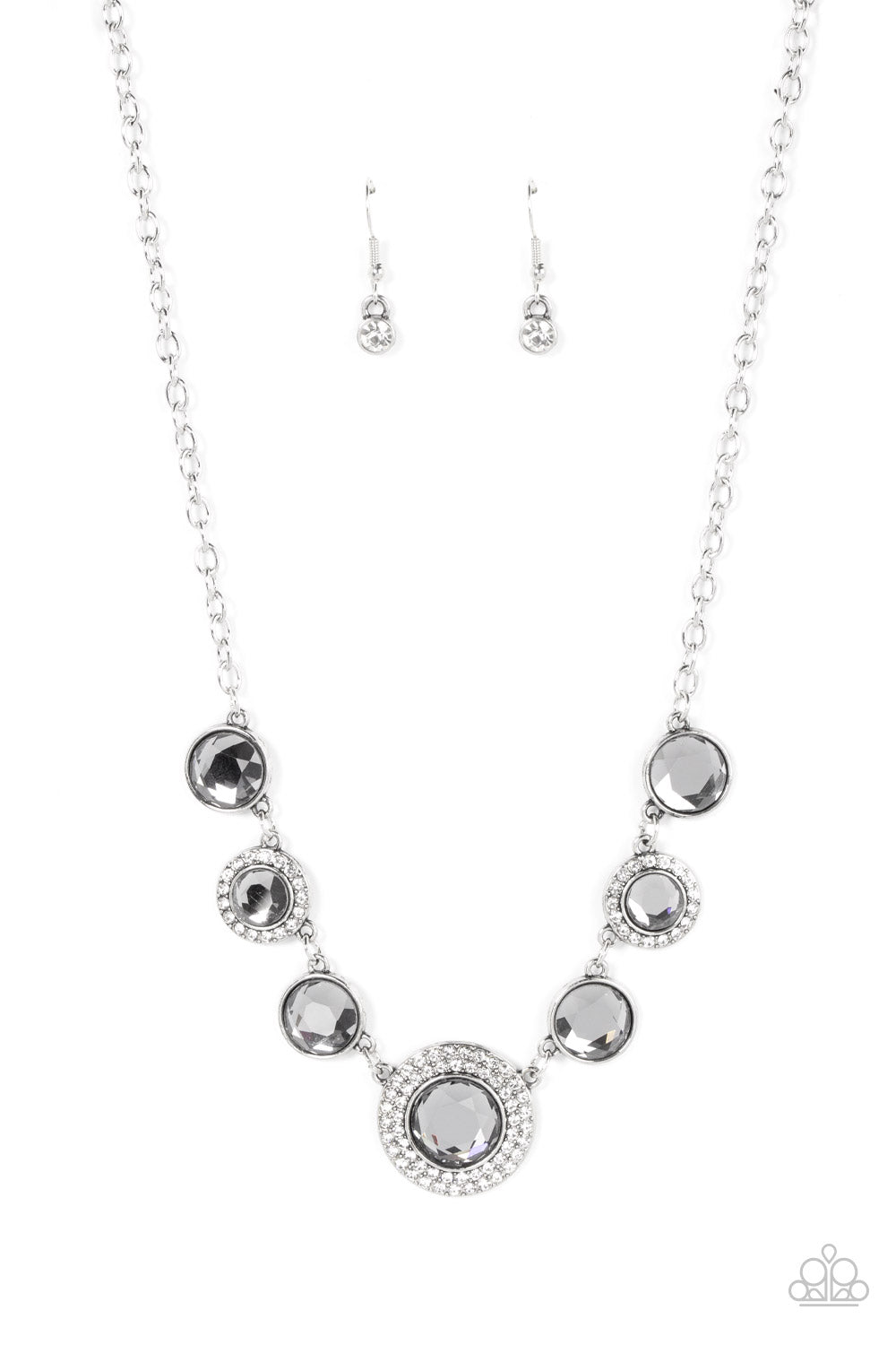 Oversized smoky gems alternate with matching gems bordered in rings of glassy white rhinestones below the collar, resulting in a spellbinding sparkle at the bottom of a classic silver chain. Features an adjustable clasp closure. 