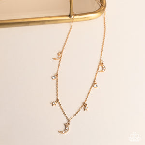 Dotted with dainty white rhinestones, a cosmic collection of gold moon and star charms swings from a dainty gold chain below the collar. Solitaire white rhinestones sparkle in between the charms, adding additional sparkle to the piece. Features an adjustable clasp closure Featured inside The Preview at GLOW! 