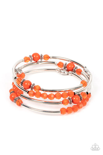 Infused with dainty silver beads, cylindrical silver rods, and swirly silver accents, a mismatched collection of burnt orange crystal-like and acrylic beads are threaded along a wire that coils around the wrist for a versatile pop of color. Featured inside The Preview at GLOW! 