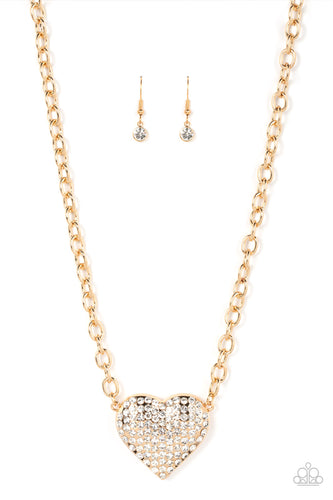 A dramatically oversized gold heart frame is encrusted in row after row of dazzling white rhinestones, resulting in a heart-racing sparkle below the collar. Features an adjustable clasp closure.