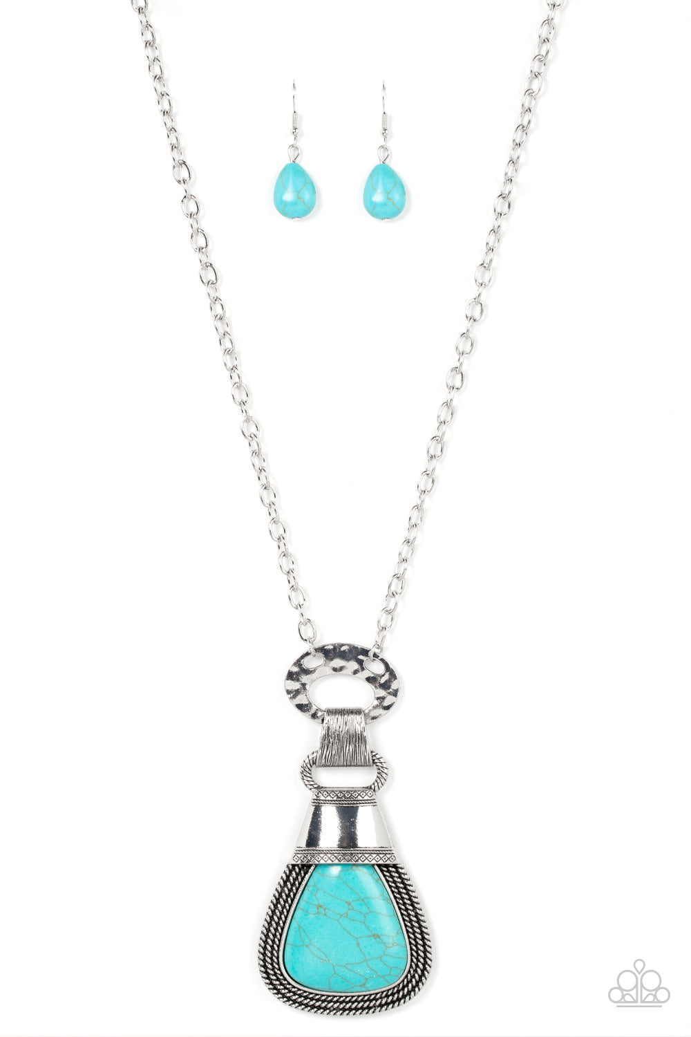 An oversized turquoise stone is encased in a silver frame made up of layers of rope-like texture and topped with an antiqued silver adornment stamped in rustic patterns. The refreshing pendant swings from a hammered silver ring and clasp at the bottom of a lengthened silver chain, resulting in a captivating finish. Features an adjustable clasp closure. 