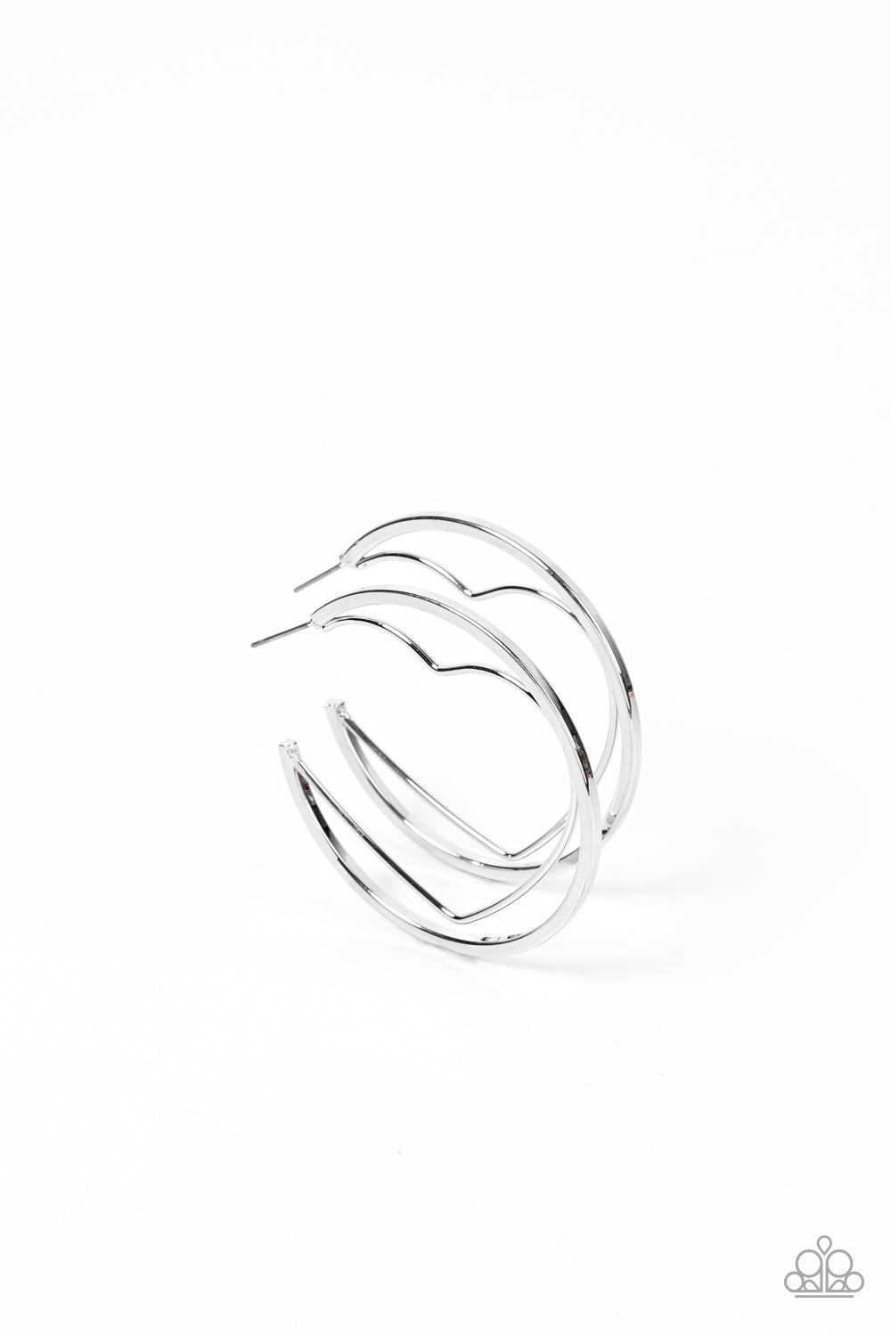 A silver wire heart is encircled in an oversized silver hoop, resulting in a heart-stopping shimmer. Earring attaches to a standard post fitting. Hoop measures approximately 2