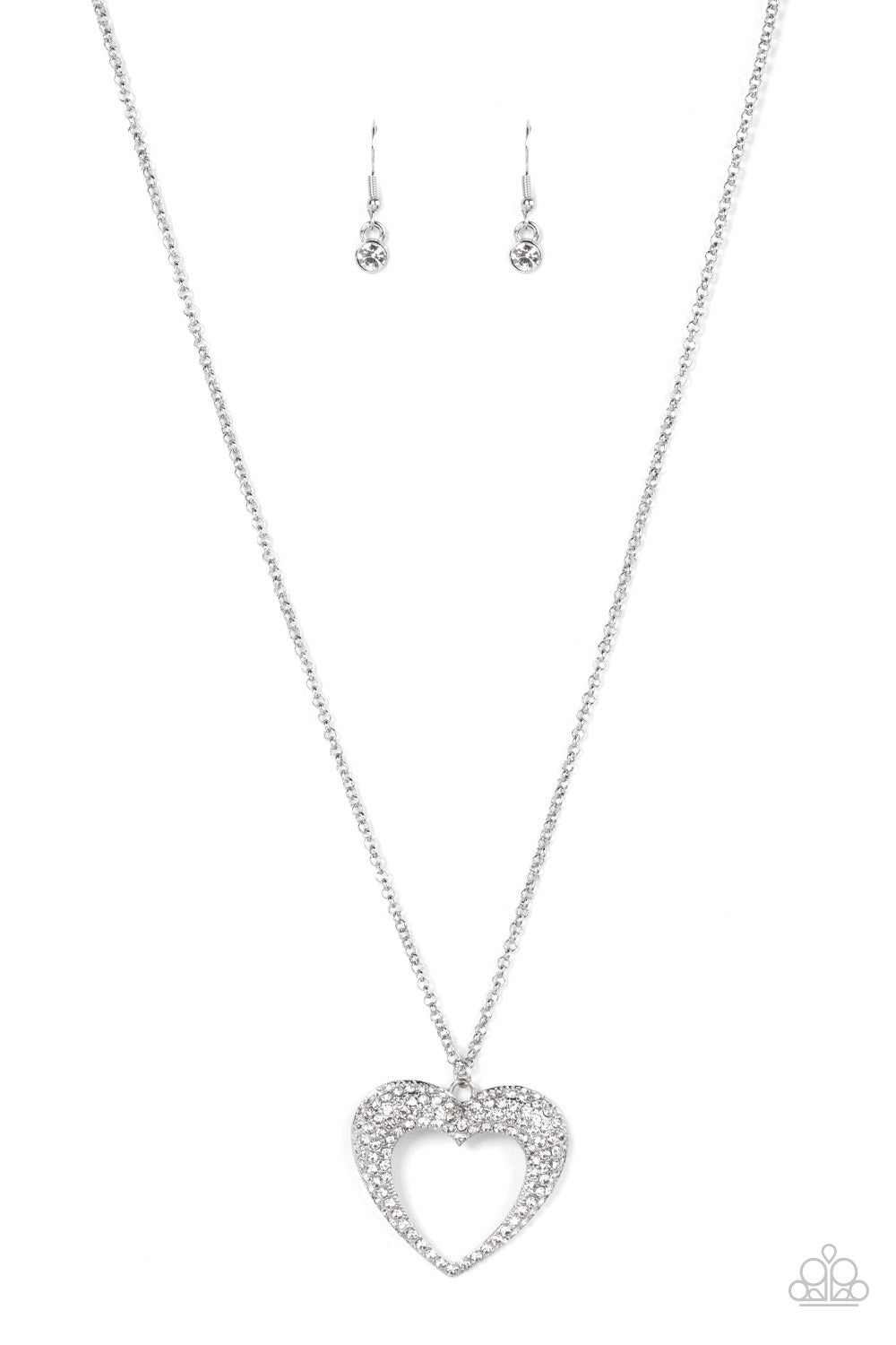 A flared silver heart is encrusted in glassy white rhinestones, resulting in a romantic shimmer at the bottom of an extended silver chain. Features an adjustable clasp closure. 