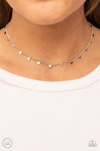 Load image into Gallery viewer, Dainty silver hearts dance from a dainty silver chain around the neck, creating a flirtatious fringe. Features an adjustable clasp closure. 
