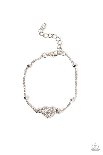 A white rhinestone dotted silver heart charm adorns a silver beaded chain, creating a romantic centerpiece. Features an adjustable clasp closure.