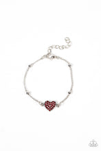 Load image into Gallery viewer, A red rhinestone dotted silver heart charm adorns a silver beaded chain, creating a romantic centerpiece. Features an adjustable clasp closure.
