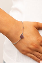 Load image into Gallery viewer, A red rhinestone dotted silver heart charm adorns a silver beaded chain, creating a romantic centerpiece. Features an adjustable clasp closure.

