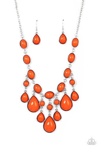 A row of burnt orange oval beads set in antiqued silver frames connect end to end across the collar. Falling from the center of the design, a trio of opulently grand teardrop beads coalesce with streams of smaller burnt orange round and teardrop beads creating a flirty fringe and dramatic allure. Features an adjustable clasp closure. 