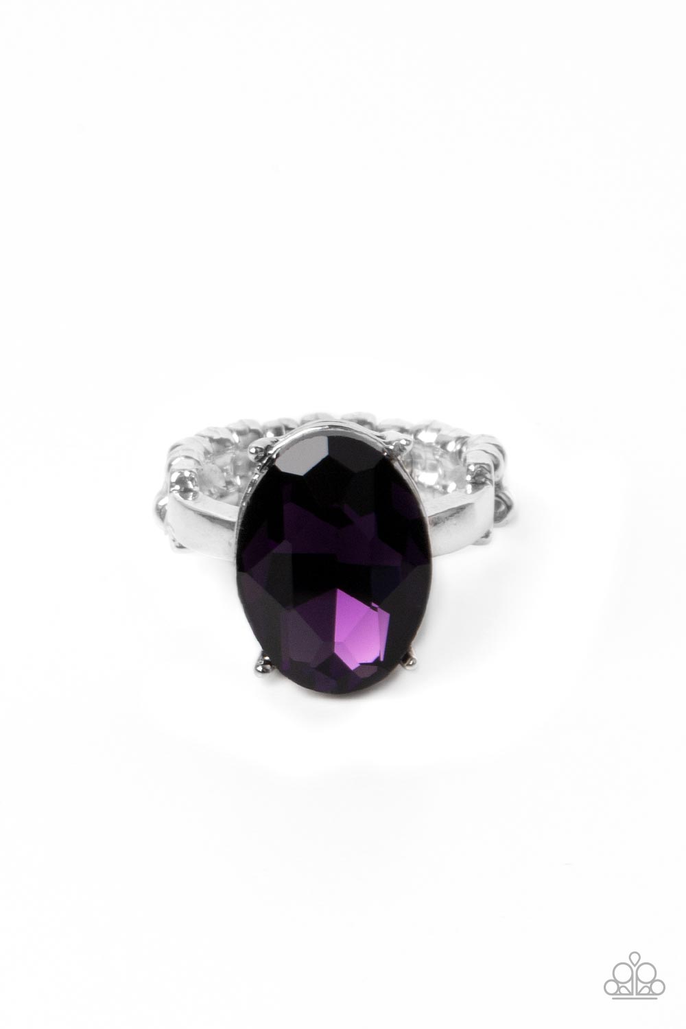 A stunning faceted plum gem, set in edgy pronged fittings, creates a glamorous show-stopping centerpiece atop sleek silver bands. Features a dainty stretchy band for a flexible fit. 