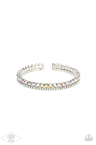 Mismatched strands of dainty and classic iridescent rhinestones stack into a delicate cuff around the wrist, creating a sparkly centerpiece.  Sold as one individual bracelet.  New Kit FANFAVORITE