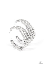 Load image into Gallery viewer, Cascading layers of sparkling white rhinestones plunge into flattened silver plates creating a stunning eye-catching hoop earring.  Earring attaches to a standard post fitting. Hoop measures approximately 2&quot; in diameter. 
