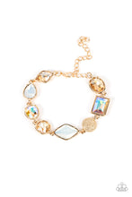 Load image into Gallery viewer, Encased in pronged gold fittings, a mismatched collection of golden, iridescent, and opal rhinestones delicately links with a studded gold frame around the wrist for a sentimental sparkle. Features an adjustable clasp closure. &lt;/P&gt;&lt;br&gt;Featured inside The Preview at GLOW! 
