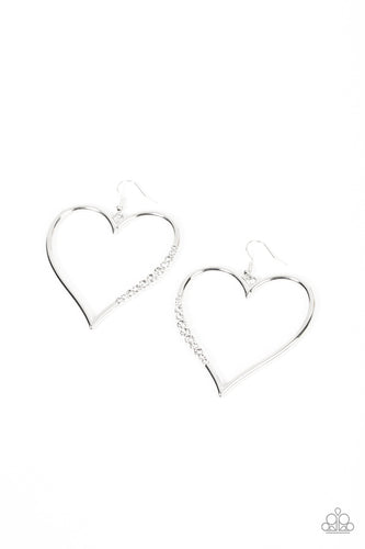 A section of glassy white rhinestones adorns a curvaceous silver heart frame, resulting in a heart-stopping sparkle. Earring attaches to a standard fishhook fitting. 