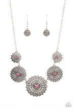 Load image into Gallery viewer, Infused with a whimsical mandala-like motif, tactile silver petals bloom from pink rhinestone dotted centers below the collar. The mismatched silver flowers gradually increase in size, exaggerating the eye-catching details. Features an adjustable clasp closure. 
