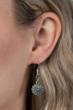 Load image into Gallery viewer, Infused with a whimsical mandala-like motif, tactile silver petals bloom from pink rhinestone dotted centers below the collar. The mismatched silver flowers gradually increase in size, exaggerating the eye-catching details. Features an adjustable clasp closure. 
