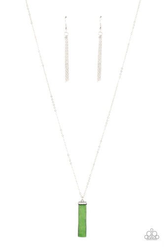 A rectangular cut jade stone is pressed into the center of a shiny silver frame at the bottom of an extended silver chain, resulting in an earthy pendant. Features an adjustable clasp closure.