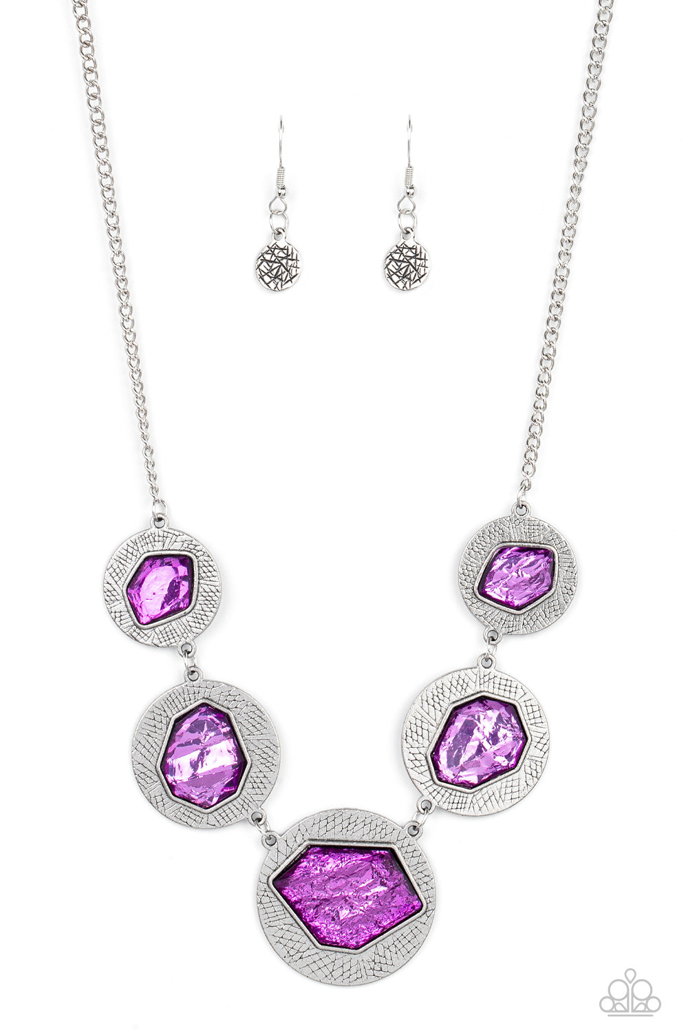 Featuring a refracted shimmer, asymmetrical, glassy purple gems sparkle atop textured silver discs as they delicately link into an edgy statement piece below the collar. Features an adjustable clasp closure. 
