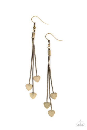 Rustic brass heart charms delicately trickle from varying lengths of rounded brass snake chain, resulting in a flirtatious tassel. Earring attaches to a standard fishhook fitting.