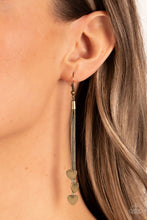 Load image into Gallery viewer, Rustic brass heart charms delicately trickle from varying lengths of rounded brass snake chain, resulting in a flirtatious tassel. Earring attaches to a standard fishhook fitting.
