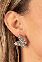 Load image into Gallery viewer, Bordered in dainty white rhinestones, emerald cut iridescent rhinestones sparkle inside the silver wings of a butterfly for an enchanting fashion. Earring attaches to a standard post fitting.
