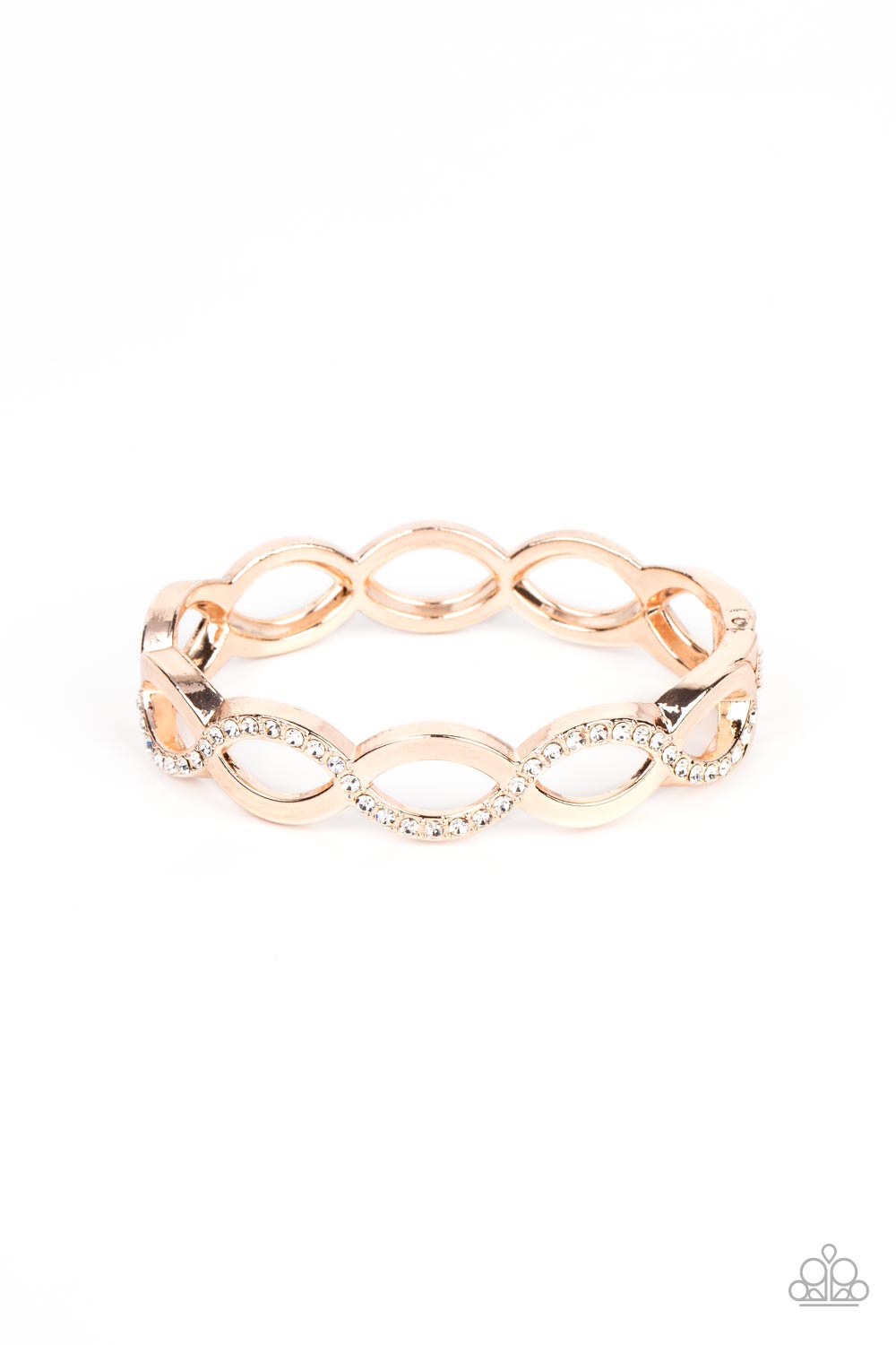 Rose gold bars elegantly intertwine into infinity inspired frames that delicately hinge around the wrist. The front of the flawless centerpiece is dusted in a wavy row of white rhinestones, adding a timeless twinkle to the versatile design. Features a hinged closure. 