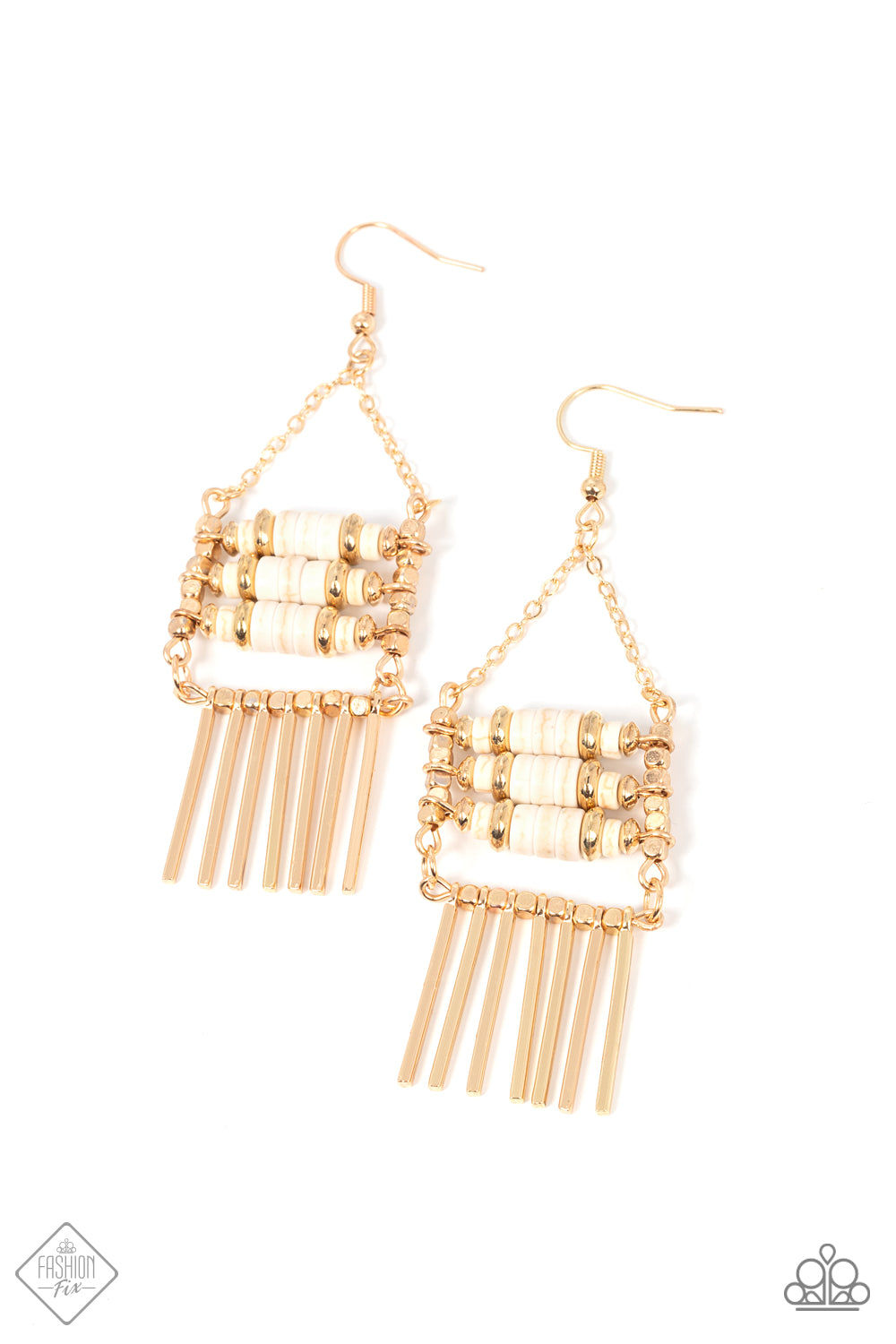 Three rows of earthy white stone discs and gold beads are stacked inside a frame of shimmery square gold beads. A fringe of shiny gold bars falls from the bottom of the square frame that is suspended from gold chains, allowing the pieces to sway freely. Earring attaches to a standard fishhook fitting.