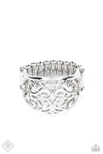 Load image into Gallery viewer, A wide, high sheen silver frame, infused with fanciful floral filigree, creates a romantically idyllic centerpiece atop the finger. Features a stretchy band for a flexible fit.  Sold as one individual ring.  New Kit Fashion Fix
