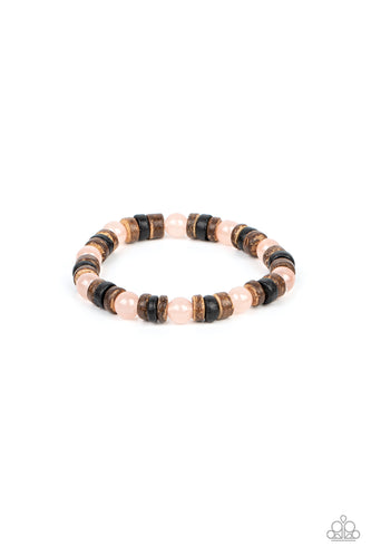 Glassy pink stone beads join trios of black and brown wooden discs along stretchy bands around the wrist, resulting in an earthy pop of color.  Sold as one individual bracelet.