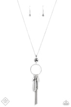 Load image into Gallery viewer, Featuring both smooth and hammered finishes, dainty smoky rhinestones, and a tassel of dainty chains, a sassy collection of silver charms swings from the bottom of a brightly textured circle. A faceted hematite gem sits atop the harmoniously audacious display at the bottom of a lengthened dainty silver chain for a crowning finish. Features an adjustable clasp closure.  Sold as one individual necklace. Includes one pair of matching earrings.  New Kit Fashion Fix
