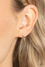 Load image into Gallery viewer, A glistening gold bar curves into a classic hoop, creating a dainty peek of shimmer. Earring attaches to a standard post fitting. Hoop measures approximately 1/2&quot; in diameter.
