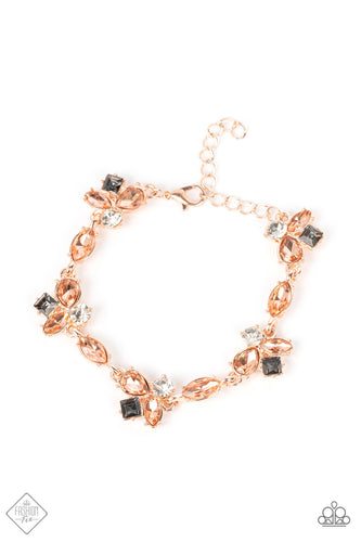 Peach teardrop and marquise gems, accented with white and smoky rhinestones, coalesce into asymmetrical frames that delicately connect into a sparkling display around the wrist. Features an adjustable clasp closure.  Sold as one individual bracelet.  New Kit Fashion Fix