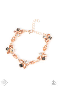 Peach teardrop and marquise gems, accented with white and smoky rhinestones, coalesce into asymmetrical frames that delicately connect into a sparkling display around the wrist. Features an adjustable clasp closure.  Sold as one individual bracelet.  New Kit Fashion Fix