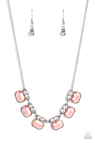 Featuring an iridescent UV finish, glitzy pink rhinestones are crowned in pairs of glassy white rhinestones as they delicately link below the collar for an out-of-this-world sparkle. Features an adjustable clasp closure.