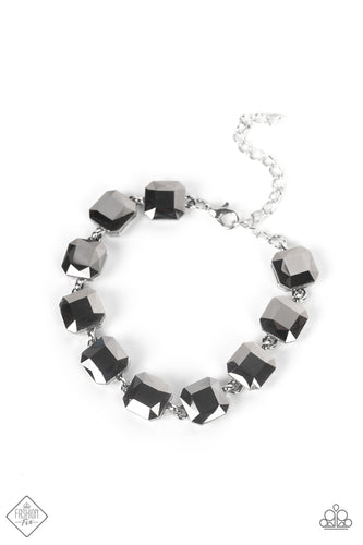 A sultry strand of faceted hematite gems unapologetically smolders as it connects around the wrist in an enticing fashion. Features an adjustable clasp closure.  Sold as one individual bracelet.  New Kit Fashion Fix