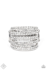 Encrusted in dainty pairs of blinding white rhinestones, row after row of glitzy silver bands stack and crisscross across the finger for a knockout look. Features a stretchy band for a flexible fit.  Sold as one individual ring.  New Kit Fashion Fix