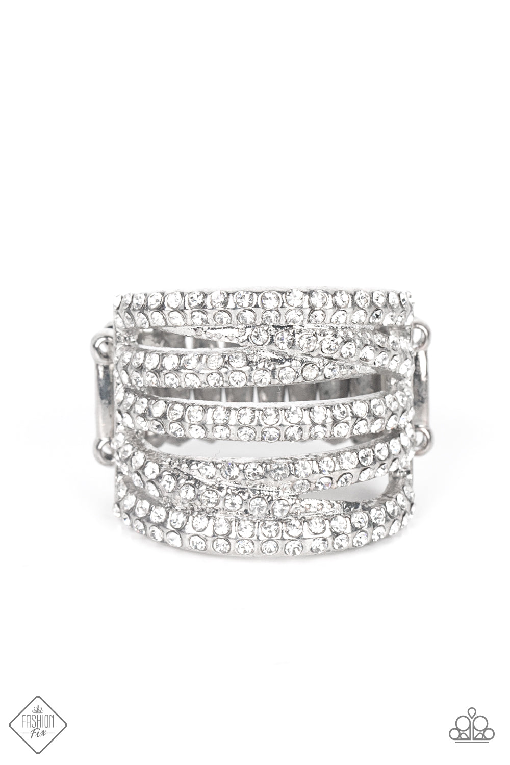 Encrusted in dainty pairs of blinding white rhinestones, row after row of glitzy silver bands stack and crisscross across the finger for a knockout look. Features a stretchy band for a flexible fit.  Sold as one individual ring.  New Kit Fashion Fix