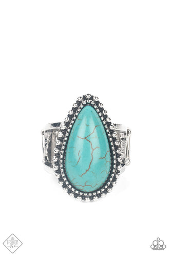 An ample turquoise teardrop stone, encased in studded antiqued texture, sits atop layered silver bands creating a harmonious statement piece atop the finger. Features a stretchy band for a flexible fit.  Sold as one individual ring.  New Kit Fashion Fix