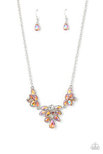 Load image into Gallery viewer, Varying in cut and shimmer, bubbly clusters of mismatched white and iridescent peach and coral rhinestones coalesce into three sparkly frames for an out-of-this-world statement below the collar. Due to its prismatic palette, color may vary. Features an adjustable clasp closure. 
