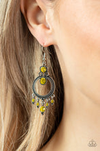 Load image into Gallery viewer, Sparkling with a pair of brilliant yellow rhinestones, a studded filigree accent attaches to the top of a studded silver hoop brimming with antiqued textures. A dainty collection of yellow rhinestones twinkles from the bottom of the frame, resulting in a glittery fringe. Earring attaches to a standard fishhook fitting. 
