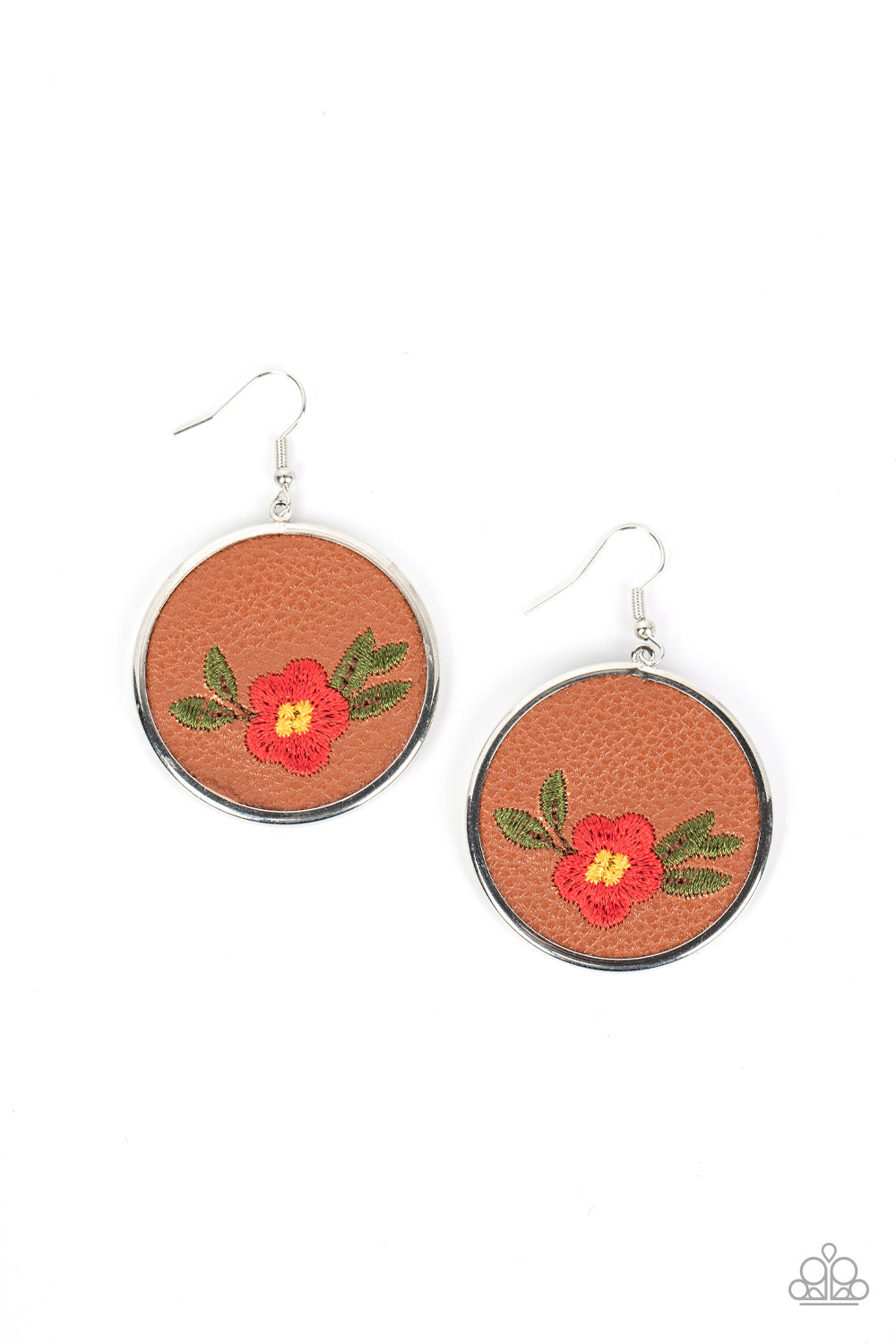 A leafy Poinciana flower is embroidered along the bottom of a piece of leather that is encased in a sleek silver frame, blooming into a homespun fashion. Earring attaches to a standard fishhook fitting. 