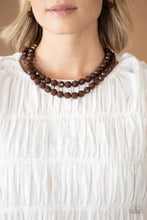 Load image into Gallery viewer, Faceted Coca Mocha and golden acrylic beads are threaded along invisible wires below the collar, creating a modern pop of color.
