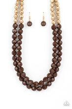 Load image into Gallery viewer, Faceted Coca Mocha and golden acrylic beads are threaded along invisible wires below the collar, creating a modern pop of color.
