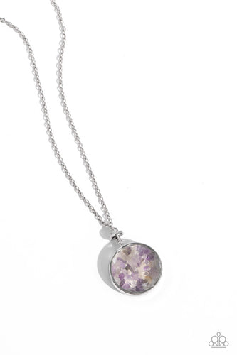 Pieces of amethyst stones shift back and forth inside a glassy frame encased in a silver compass-like fitting, resulting in a dramatically earthy pendant at the bottom of an extended silver chain. Features an adjustable clasp closure.