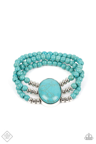 Layers of turquoise beads are threaded along stretchy bands that connect to a stunning oval turquoise stone, creating an extraordinary statement piece around the wrist.  Sold as one individual bracelet.  New Kit Fashion Fix