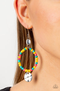 Featuring the summery hues of Empire Yellow, Beetroot Purple, and Harbor Blue, dainty seed beads are threaded along a wire hoop that swings between two hammered silver discs for a tropical inspired fashion. Earring attaches to a standard fishhook fitting.