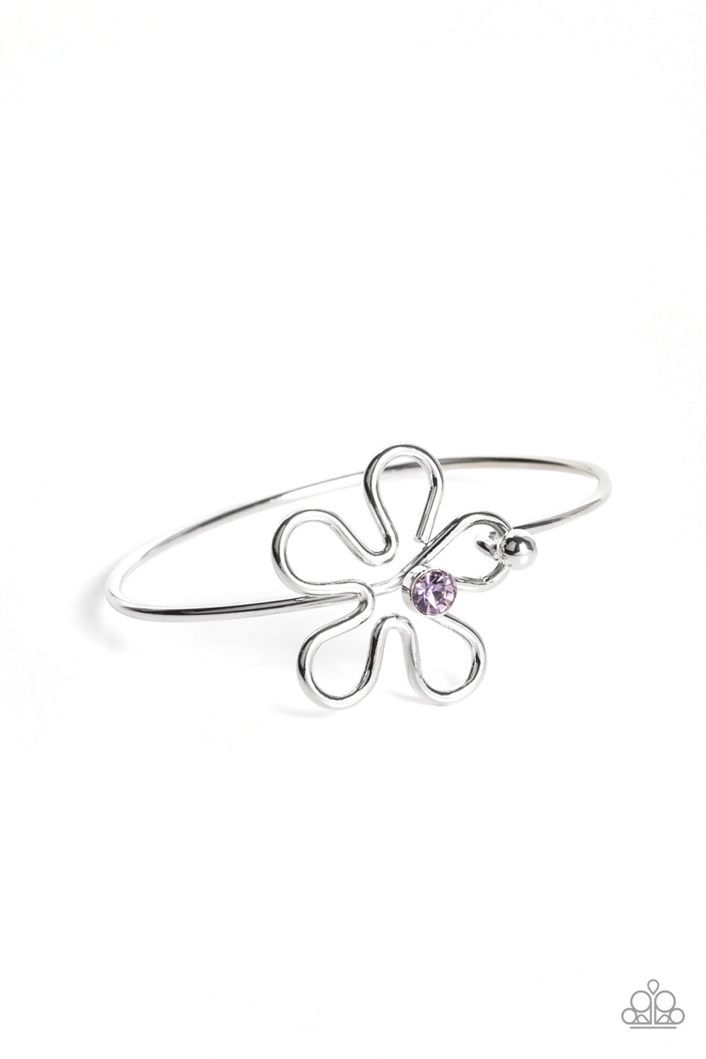 Dotted with a sparkly purple rhinestone center, shiny silver bars curve into a floral frame atop a dainty silver bangle around the wrist. Features a pronged closure. 