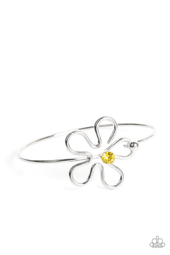 Dotted with a Daffodil rhinestone center, shiny silver bars curve into a floral frame atop a dainty silver bangle around the wrist. Features a pronged closure.