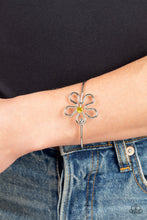 Load image into Gallery viewer, Dotted with a Daffodil rhinestone center, shiny silver bars curve into a floral frame atop a dainty silver bangle around the wrist. Features a pronged closure.
