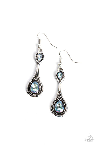 wo iridescent blue rhinestones adorn the top and bottom of an extended silver lure radiating with studded textures, resulting in an ethereal dazzle. Earring attaches to a standard fishhook fitting. Due to its prismatic palette, color may vary. 